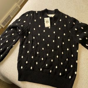 Lost and Wander black with white crosses